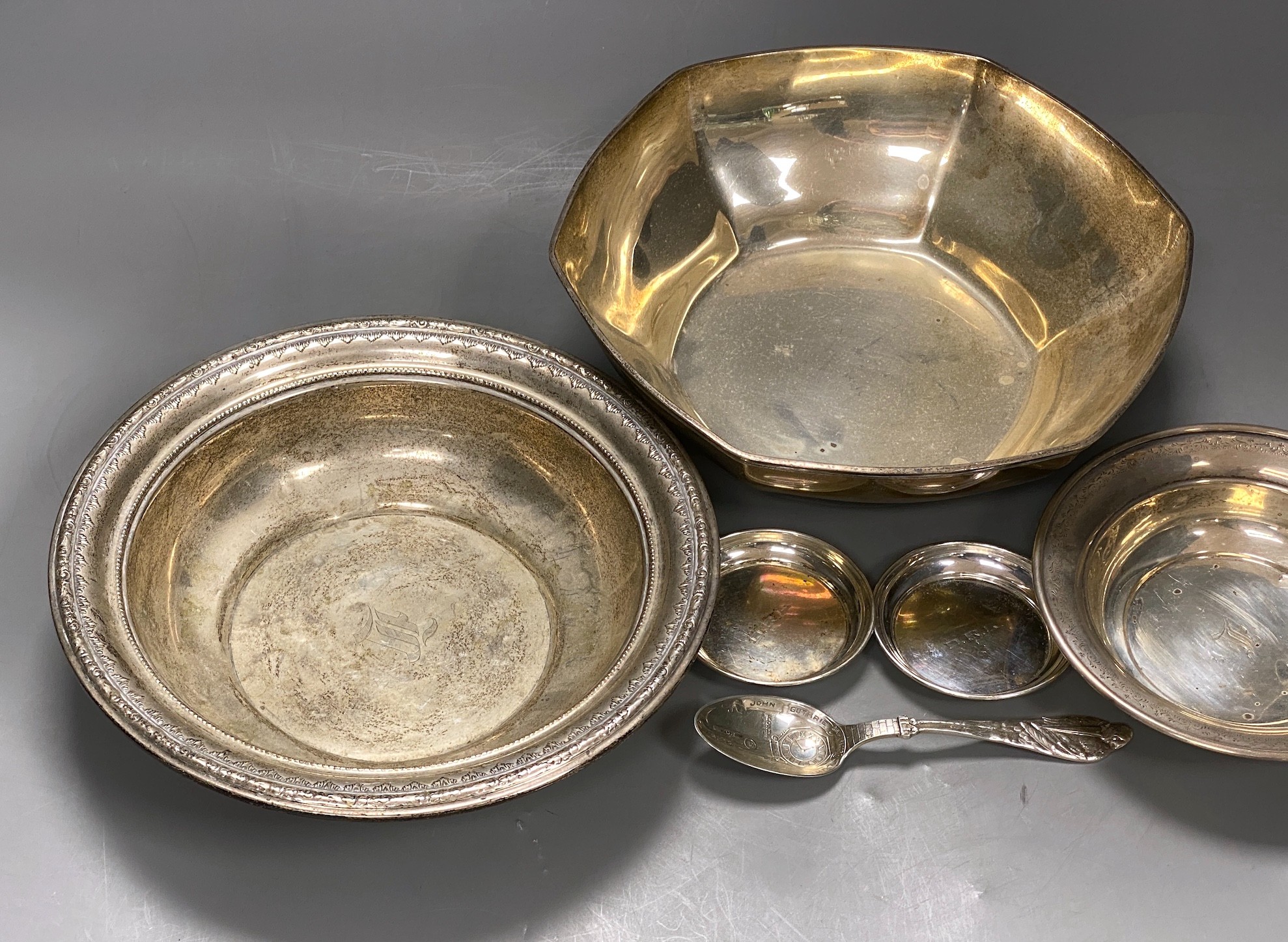 An early 20th century Tiffany & Co hexagonal sterling 925 fruit bowl, diameter 21.9cm, together with two other sterling bowls, two small sterling dishes and a sterling spoon, 29oz.